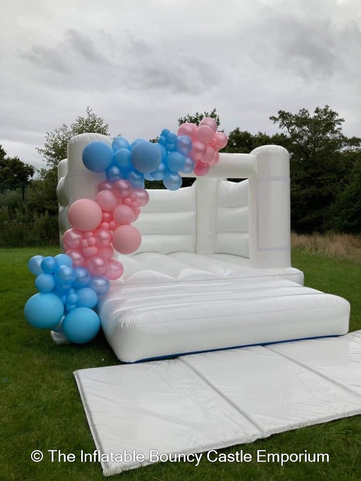 White Bouncy Castle with Balloon Garland Bouncy Castle & Soft Play