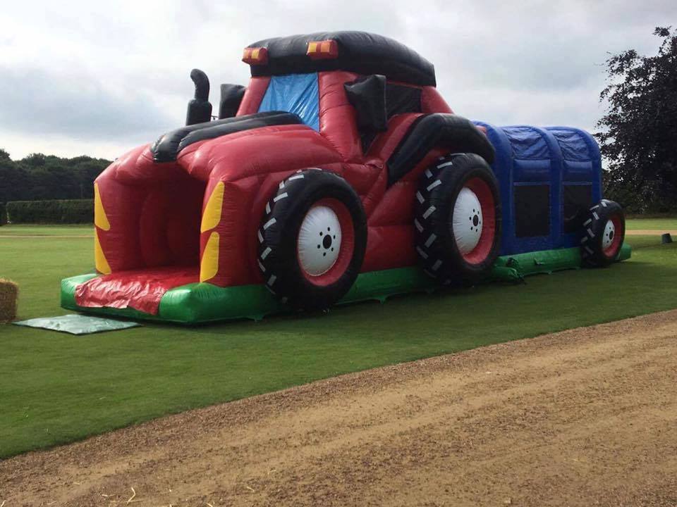 Inflatable tractor obstacle course set up in Cheshire for a birthday celebration